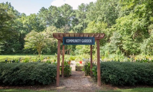 a sign in a garden