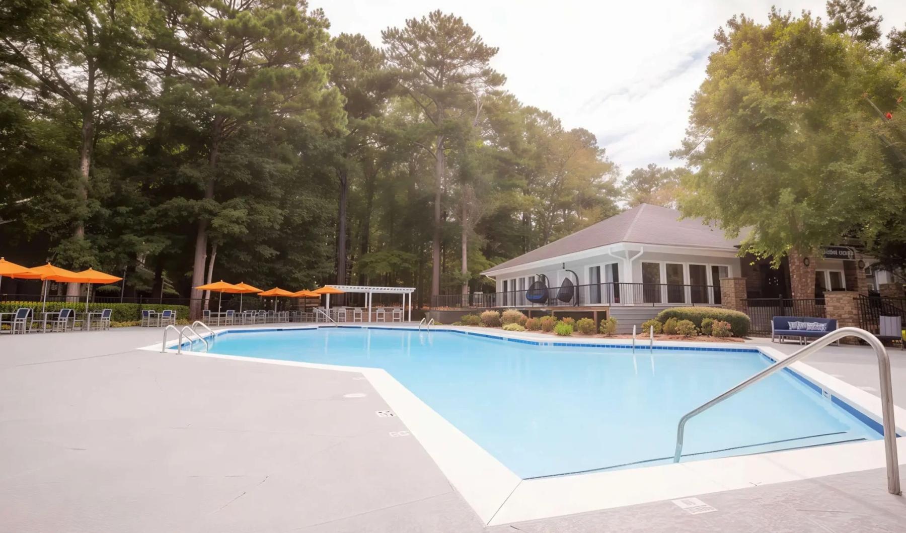 a swimming pool in front of a building