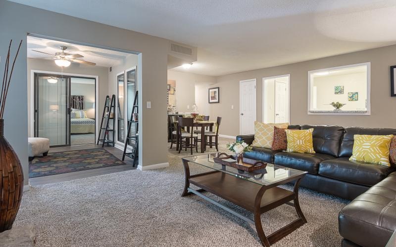 a living room with a couch and coffee table